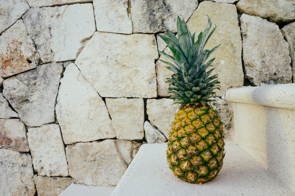 Pineapple on a porch staircase